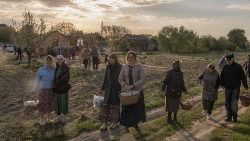 Orthodox believers carry traditional Easter baskets in the village of Krasne, Ukraine