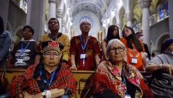 (FILE PHOTO) Indigeous people listen to Pope Francis celebrating mass at the National Shrine of Saint-Anne-de-Beaupre, Canada 