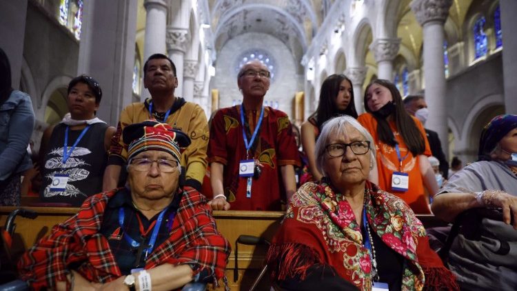 (FILE PHOTO) Indigeous people listen to Pope Francis celebrating mass at the National Shrine of Saint-Anne-de-Beaupre, Canada 