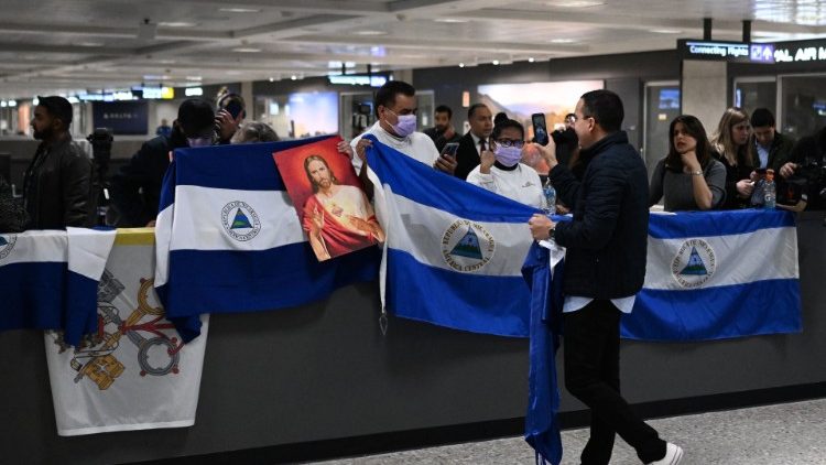 Activists welcome a Nicaraguan deportee to Dulles International Airport in the US state of Virginia