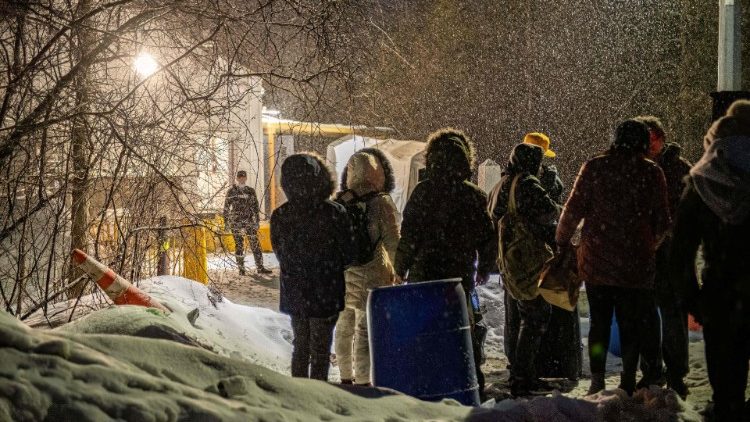 Migrants from Venezuela and other countries at the border crossing in Quebec