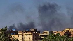 Smoke rises over buildings in southern Khartoum (file photo)