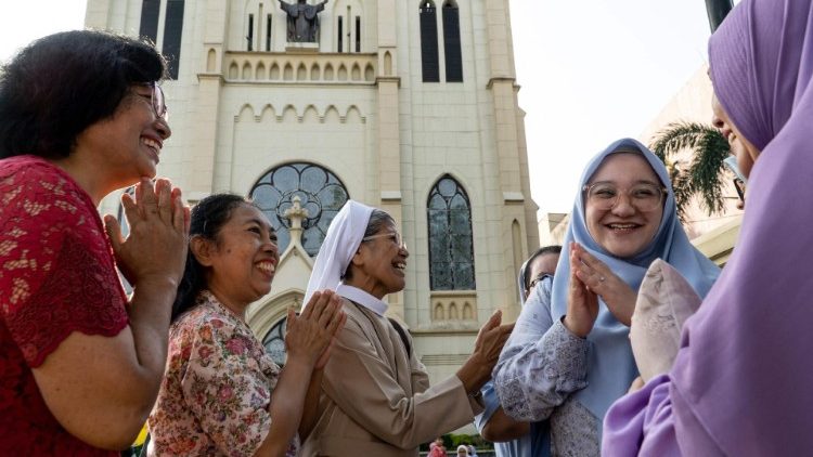 Peaceful coexistence among religions in Indonesia seen as Muslims marked the end of Ramadan, on the grounds of the Sacred Heart of Jesus Catholic Church due to their nearby mosque being full (10 April) 