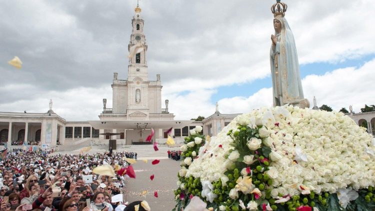 A statue of Our Lady of Fatima is carried in procession at the Sanctuary