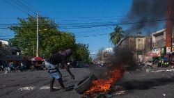 Haitians protest in Port-au-Prince to demand Prime Minister Henry's resignation