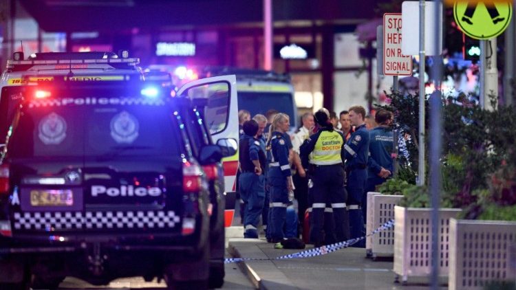 Police and rescuers in the Sydney mall where six people were stabbed to death