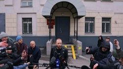 Daniil Berman, a lawyer of the Wall Street Journal reporter Evan Gershkovich, detained on suspicion of espionage, speaks to the journalists outside a court building in Moscow