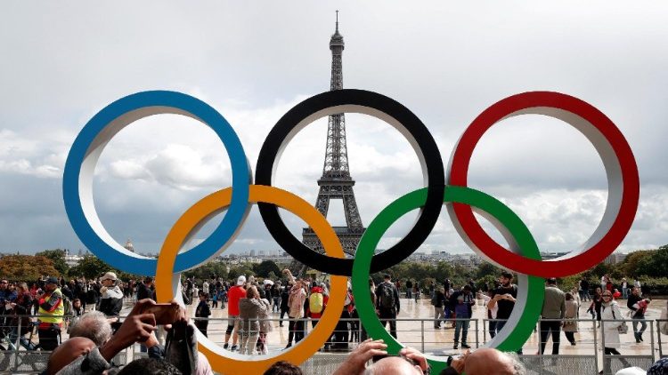 Olympic rings seen in front of the Eiffel Tower in Paris