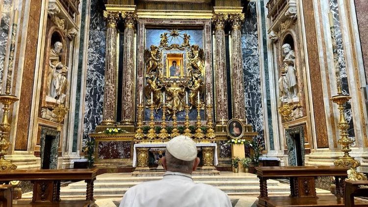 Pope Francis prays in front of the icon of Mary "Salus Populi Romani" (Salvation of the Roman People)