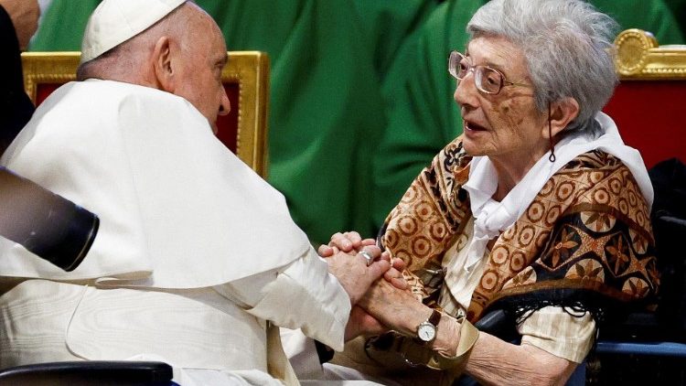 File photo of Pope Francis with an elderly woman