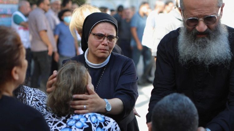 Worshippers attend a funeral at Greek Orthodox Saint Porphyrius Church, in Gaza City