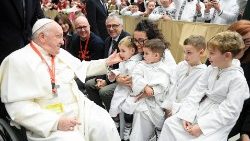 Pope Francis greets children in the Vatican (file photo)