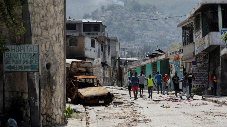 Alleged gang leader calls on supporters to retake control of neighborhood, in Port-au-Prince