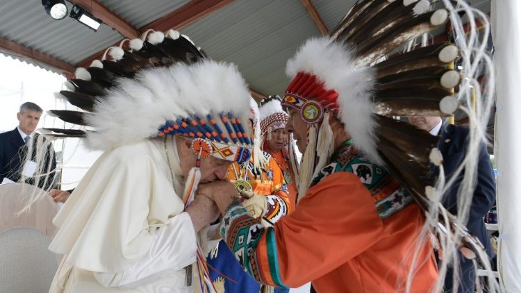 Pope Francis kisses Chief Wilton Littlechild in Maskwacis, Canada
