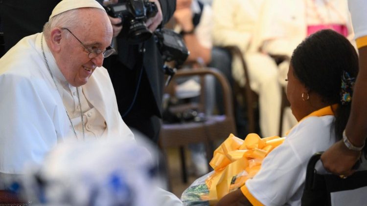 Pope Francis meeting people assisted by the charities he met in the Nuntiature