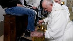 Pope Francis washes the feet of young women at the Mass of the Lord's Supper in 2023
