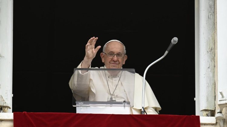 Pope Francis waves to the faithful in St. Peter's Square