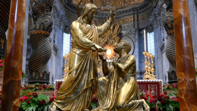 A sculpture of Jesus and the Apostle Peter in St. Peter's Basilica