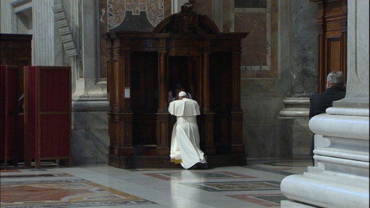 File photo of Pope Francis confessing in St. Peter's Basilica