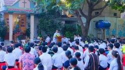 Messe au foyer pour enfants géré par les oblats du Vietnam