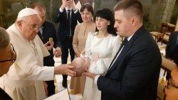 Pope Francis baptises a Ukrainian newborn at the Casa Santa Marta