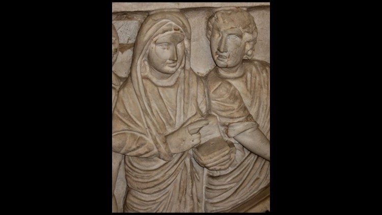 Image d'une femme décédée (anonyme) avec un codex et dans l'attitude d'un orateur, alors que le Christ s'approche pour lui parler.