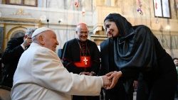 Pope Francis greets an artist of the Venice Art Biennale