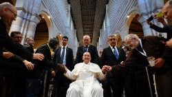 Pope Francis greets priests at the Basilica of Saint Zeno in Verona