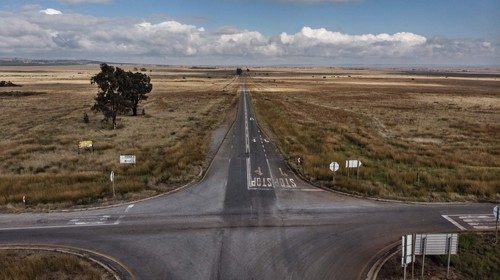 This aerial view taken on April 29, 2020, shows a deserted crossroads in the middle of farmland near ...