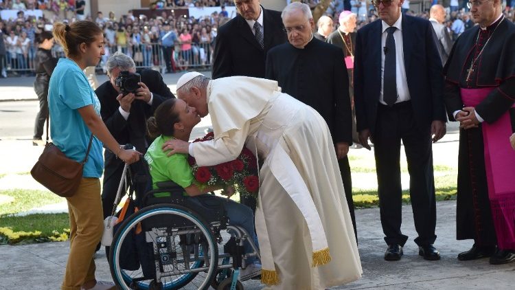 Pope greets disabled woman in Sicily (file photo)