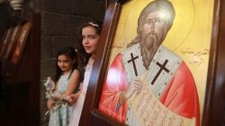 Crianças católicas em celebração de Domingo de Ramos de 2019, em Damasco