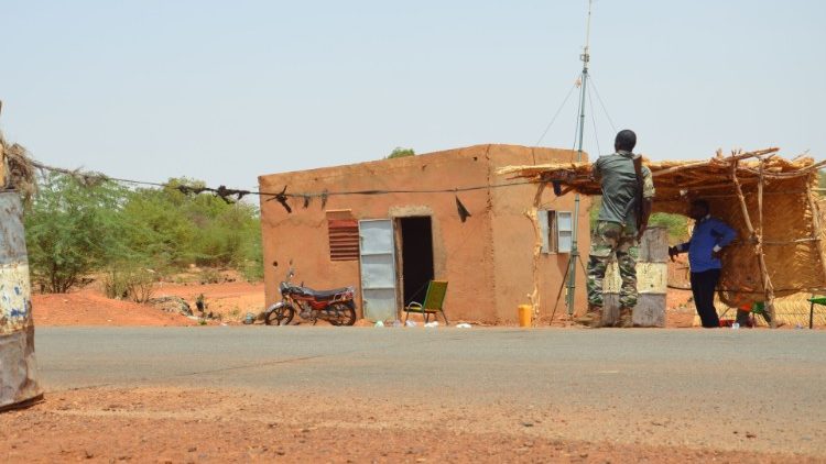 An archive image shows armed policemen in Niger at a police checkpoint