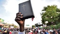 Sudanese Christians during one of the protests that led to the fall of general mar al-Bashir