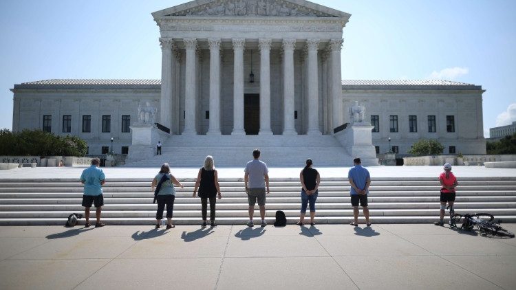 Anti-abortion demonstrators stand outside the US Supreme Court