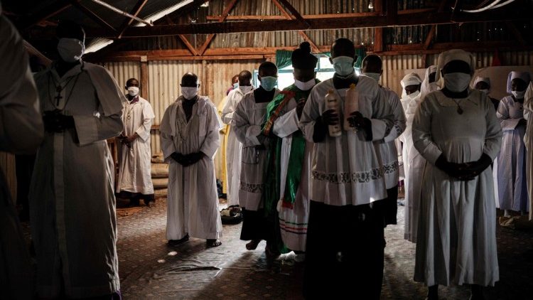 Members of the Legion of Mary attending Church in the Kebera slum of Nairobi 26 July 2020