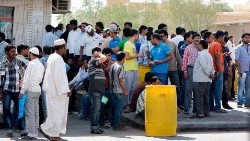 Foreign workers outside Saudi Arabia's immigration department in the capital Riyadh. 
