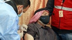 Impfung eines Flüchtlings in Jordanien