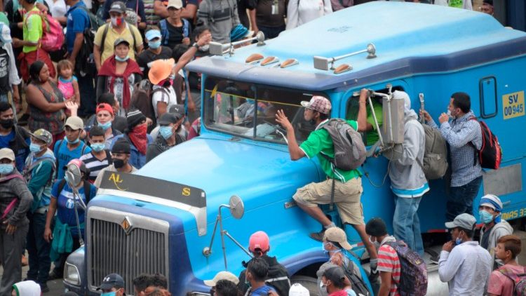 Migrants who arrived in caravan from Honduras on their way to the US are blocked by security forces in Guatemala