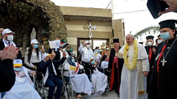Pope Francis greets people with disabilities in Baghdad, Iraq, on March 5, 2021.
