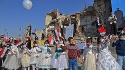 Иракски деца по време на визитата на папата в страната