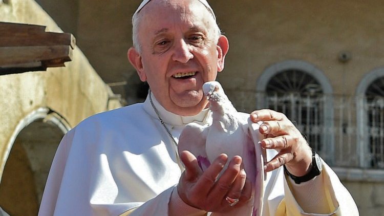 Pope Francis holds a dove during his journey to Iraq (file photo)