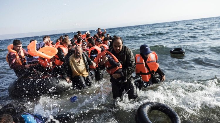 Syrian refugees arrive on Greece's Lesbos island in August 2015