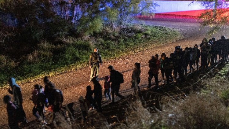 Migrants cross into Texas from Mexico, 30 April 2021