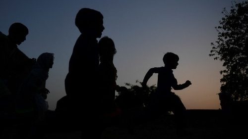Children at play in the twilight