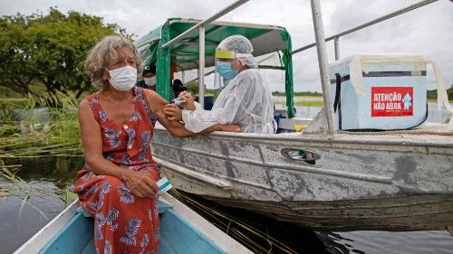 File photo of an Amazonian women getting a Covid-19 jab in Brazil's Amazonas State