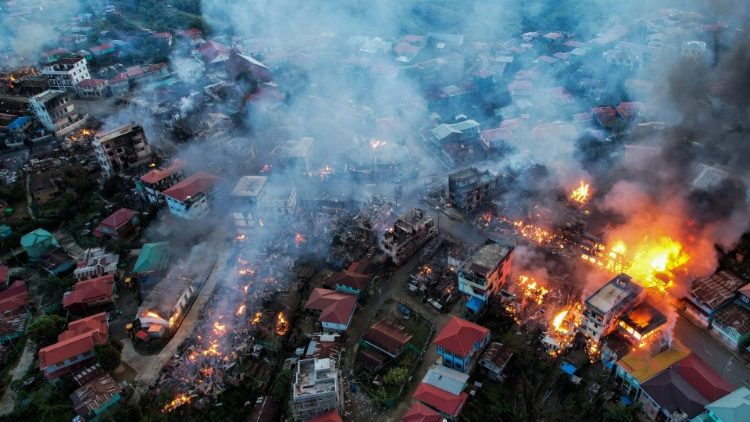 An aerial photo of Thantlang, in Myanmar's Chin state, shows fires caused by military shelling. 