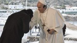Pope Francis meets a refugee in Mytilene Reception and Identification Centre on the Island of Lesbos in Greece