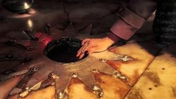 A member of the faithful touches the star marking the birthplace of Jesus inside the Grotto at the Church of the Nativity in Bethlehem