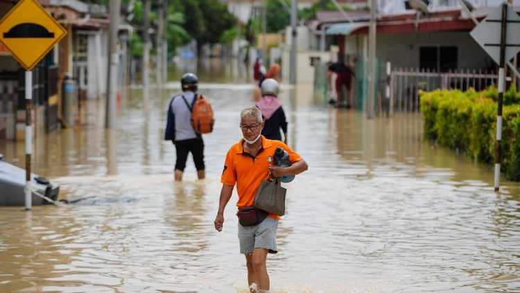 A flooded road in Batu Berendam in Malaysia's southern coastal state of Malacca.