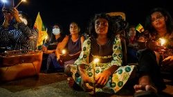 Demonstrators light candles during a silent protest to pay respect to the victims of the 2019 Easter Sunday bombings in Sri Lanka